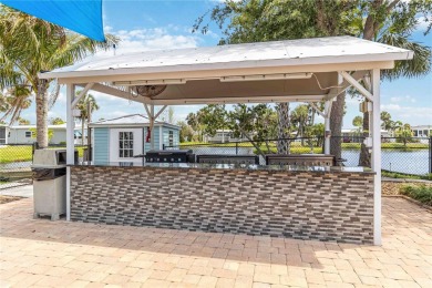 Welcome to a refined slice of paradise in the prestigious on Twin Isles Country Club in Florida - for sale on GolfHomes.com, golf home, golf lot