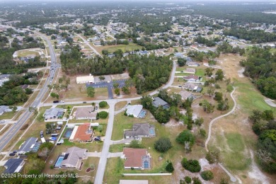 Welcome to 5356 Kirkwood Ave, a home in the heart of Spring Hill on Oak Hills Country Club in Florida - for sale on GolfHomes.com, golf home, golf lot