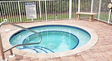 Stunning Designer Condo with Expansive Lake Views in the Heart on Pelican Sound Golf and River Club in Florida - for sale on GolfHomes.com, golf home, golf lot