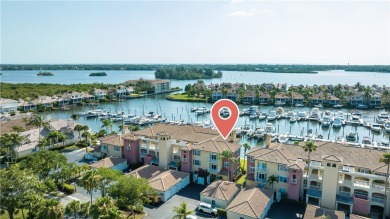 Rarely available three-bedroom penthouse with stunning views of on Grand Harbor Golf and Country Club in Florida - for sale on GolfHomes.com, golf home, golf lot