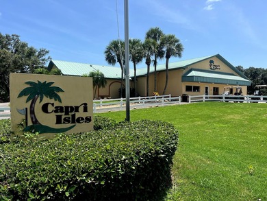 **PRICE IMPROVEMENT WITH BONUS FURNITURE!** This COASTAL CHIC on Capri Isle Golf Club in Florida - for sale on GolfHomes.com, golf home, golf lot