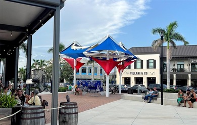 **PRICE IMPROVEMENT WITH BONUS FURNITURE!** This COASTAL CHIC on Capri Isle Golf Club in Florida - for sale on GolfHomes.com, golf home, golf lot