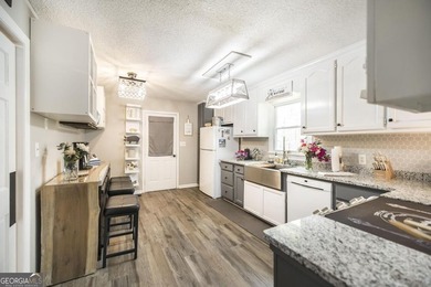 Gnome Sweet Gnome! Thoughtful improvements add practicality and on Golf Club of Macon in Georgia - for sale on GolfHomes.com, golf home, golf lot