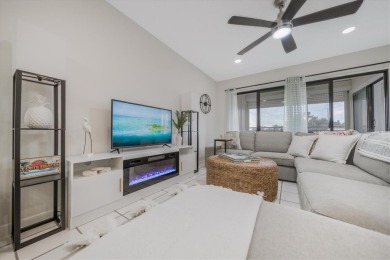 TOP FLOOR, END UNIT! Discover a slice of paradise at 6372 Palma on Isla Del Sol Yacht and Country Club in Florida - for sale on GolfHomes.com, golf home, golf lot