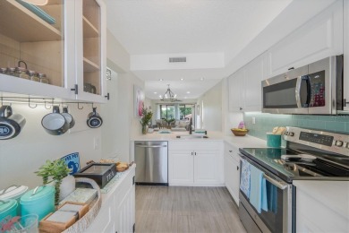 TOP FLOOR, END UNIT! Discover a slice of paradise at 6372 Palma on Isla Del Sol Yacht and Country Club in Florida - for sale on GolfHomes.com, golf home, golf lot