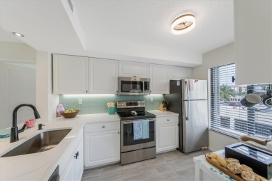 TOP FLOOR, END UNIT! Discover a slice of paradise at 6372 Palma on Isla Del Sol Yacht and Country Club in Florida - for sale on GolfHomes.com, golf home, golf lot