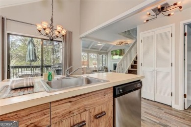 This spectacular villa offers seasonal views of Lake Petit and on Big Canoe Golf Club - Cherokee in Georgia - for sale on GolfHomes.com, golf home, golf lot