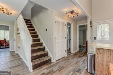 This spectacular villa offers seasonal views of Lake Petit and on Big Canoe Golf Club - Cherokee in Georgia - for sale on GolfHomes.com, golf home, golf lot