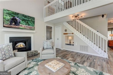 This spectacular villa offers seasonal views of Lake Petit and on Big Canoe Golf Club - Cherokee in Georgia - for sale on GolfHomes.com, golf home, golf lot