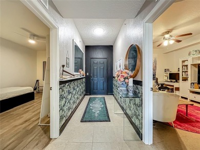 This one is EPIC!! Convenient, maintenance free living near all on MetroWest Golf Club in Florida - for sale on GolfHomes.com, golf home, golf lot