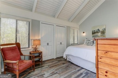 This spectacular villa offers seasonal views of Lake Petit and on Big Canoe Golf Club - Cherokee in Georgia - for sale on GolfHomes.com, golf home, golf lot