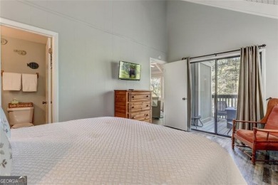 This spectacular villa offers seasonal views of Lake Petit and on Big Canoe Golf Club - Cherokee in Georgia - for sale on GolfHomes.com, golf home, golf lot