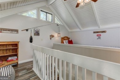 This spectacular villa offers seasonal views of Lake Petit and on Big Canoe Golf Club - Cherokee in Georgia - for sale on GolfHomes.com, golf home, golf lot