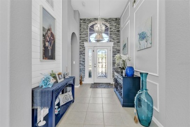 Tremendous Craftsmanship in this Ashton Floorplan in the gated on Kings Gate Golf Club in Florida - for sale on GolfHomes.com, golf home, golf lot