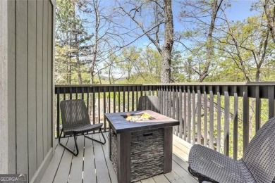 This spectacular villa offers seasonal views of Lake Petit and on Big Canoe Golf Club - Cherokee in Georgia - for sale on GolfHomes.com, golf home, golf lot