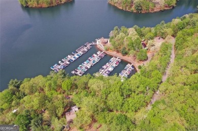 This spectacular villa offers seasonal views of Lake Petit and on Big Canoe Golf Club - Cherokee in Georgia - for sale on GolfHomes.com, golf home, golf lot