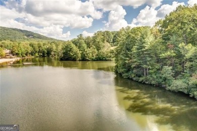 This spectacular villa offers seasonal views of Lake Petit and on Big Canoe Golf Club - Cherokee in Georgia - for sale on GolfHomes.com, golf home, golf lot