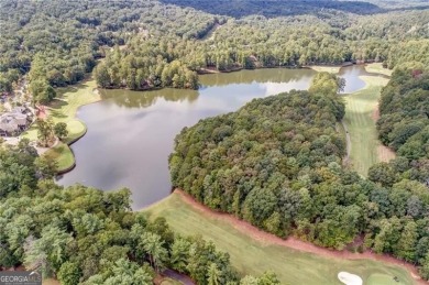 This spectacular villa offers seasonal views of Lake Petit and on Big Canoe Golf Club - Cherokee in Georgia - for sale on GolfHomes.com, golf home, golf lot