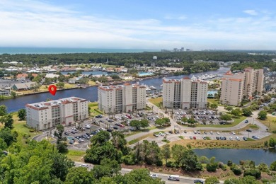 Welcome to this beautifully furnished 4-bedroom, 4-bath condo on Barefoot Resort and Golf Club  in South Carolina - for sale on GolfHomes.com, golf home, golf lot