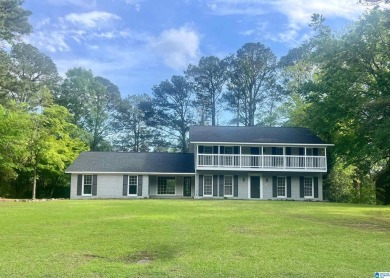 BRAND NEW ROOF! Step into this beautifully renovated 4-bedroom on Woodland Forrest Country Club in Alabama - for sale on GolfHomes.com, golf home, golf lot