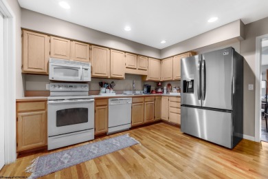 This lovely end unit townhome offers the perfect blend of on Lakeview Golf Resort and Spa - Lakeview in West Virginia - for sale on GolfHomes.com, golf home, golf lot
