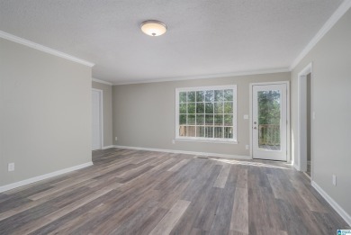 BRAND NEW ROOF! Step into this beautifully renovated 4-bedroom on Woodland Forrest Country Club in Alabama - for sale on GolfHomes.com, golf home, golf lot
