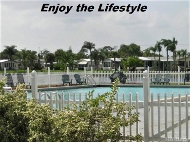 DRASTICALLY REDUCED - NEEDS SOME TLC - WAY BELOW MARKET VALUE! on The Club At Pointe West in Florida - for sale on GolfHomes.com, golf home, golf lot
