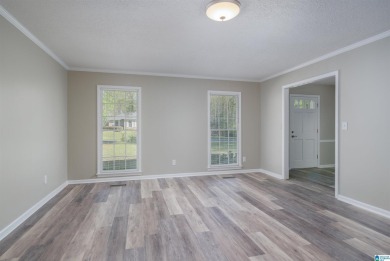 BRAND NEW ROOF! Step into this beautifully renovated 4-bedroom on Woodland Forrest Country Club in Alabama - for sale on GolfHomes.com, golf home, golf lot