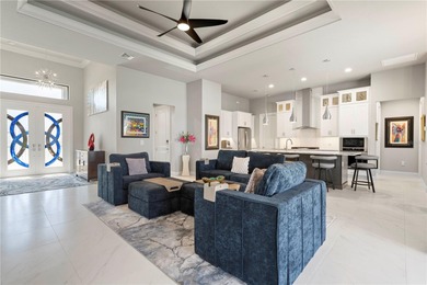 SHOWCASE HOME W/A WATER VIEW IN PGI! Check out this exceptional on Saint Andrews South Golf Club in Florida - for sale on GolfHomes.com, golf home, golf lot