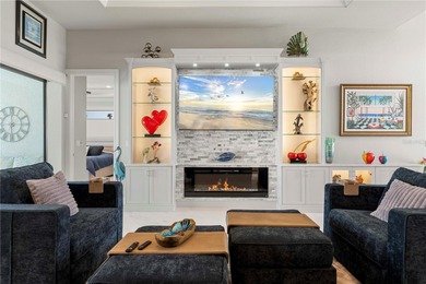 SHOWCASE HOME W/A WATER VIEW IN PGI! Check out this exceptional on Saint Andrews South Golf Club in Florida - for sale on GolfHomes.com, golf home, golf lot