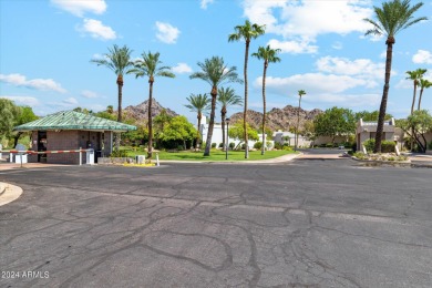 Welcome to this charming golf course bungalow! Turnkey and ready on Arizona Biltmore Golf and Country Club in Arizona - for sale on GolfHomes.com, golf home, golf lot