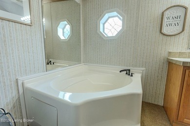 This spacious 3 bed, 3 full bath home in the gated Perry Park on Perry Park Golf Resort in Kentucky - for sale on GolfHomes.com, golf home, golf lot