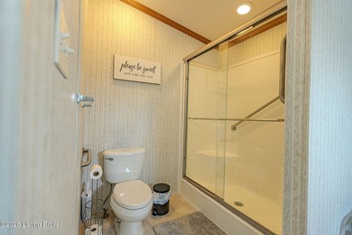 This spacious 3 bed, 3 full bath home in the gated Perry Park on Perry Park Golf Resort in Kentucky - for sale on GolfHomes.com, golf home, golf lot