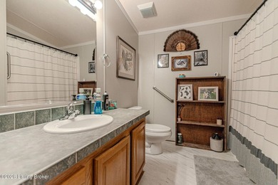 This spacious 3 bed, 3 full bath home in the gated Perry Park on Perry Park Golf Resort in Kentucky - for sale on GolfHomes.com, golf home, golf lot