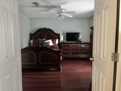 Well-maintained, all-brick 4-bedroom, 2-bath home located in the on Rocky Bayou Country Club in Florida - for sale on GolfHomes.com, golf home, golf lot