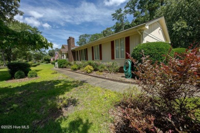 Stunning ranch-style home in River Bend! This one-story offers a on River Bend Golf and Country Club in North Carolina - for sale on GolfHomes.com, golf home, golf lot