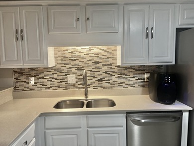 Well-maintained, all-brick 4-bedroom, 2-bath home located in the on Rocky Bayou Country Club in Florida - for sale on GolfHomes.com, golf home, golf lot