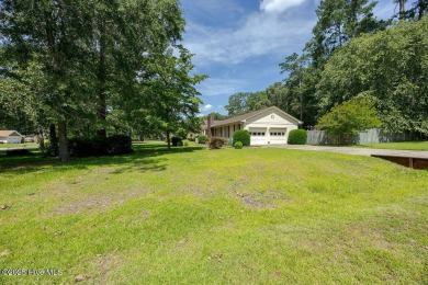 Stunning ranch-style home in River Bend! This one-story offers a on River Bend Golf and Country Club in North Carolina - for sale on GolfHomes.com, golf home, golf lot