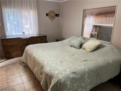 Welcome to Tamiami Village! Location is Great! Rare corner lot on Six Lakes Country Club in Florida - for sale on GolfHomes.com, golf home, golf lot