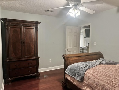 Well-maintained, all-brick 4-bedroom, 2-bath home located in the on Rocky Bayou Country Club in Florida - for sale on GolfHomes.com, golf home, golf lot