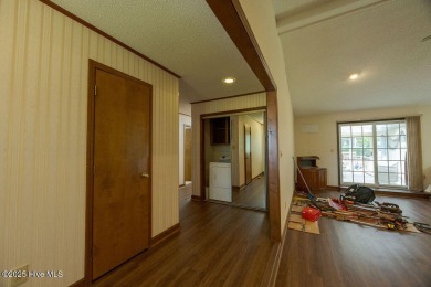 Stunning ranch-style home in River Bend! This one-story offers a on River Bend Golf and Country Club in North Carolina - for sale on GolfHomes.com, golf home, golf lot