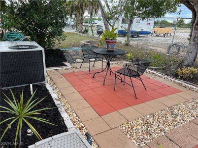 Welcome to Tamiami Village! Location is Great! Rare corner lot on Six Lakes Country Club in Florida - for sale on GolfHomes.com, golf home, golf lot