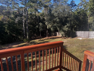 Well-maintained, all-brick 4-bedroom, 2-bath home located in the on Rocky Bayou Country Club in Florida - for sale on GolfHomes.com, golf home, golf lot