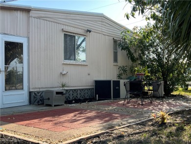 Welcome to Tamiami Village! Location is Great! Rare corner lot on Six Lakes Country Club in Florida - for sale on GolfHomes.com, golf home, golf lot