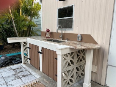 Welcome to Tamiami Village! Location is Great! Rare corner lot on Six Lakes Country Club in Florida - for sale on GolfHomes.com, golf home, golf lot