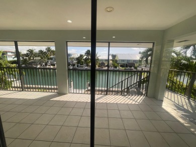 Full Duplex: Live in the gorgeous, NEW, lower level, which is on Key Colony Beach Golf Course in Florida - for sale on GolfHomes.com, golf home, golf lot