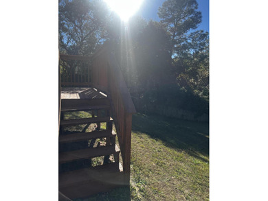 Well-maintained, all-brick 4-bedroom, 2-bath home located in the on Rocky Bayou Country Club in Florida - for sale on GolfHomes.com, golf home, golf lot