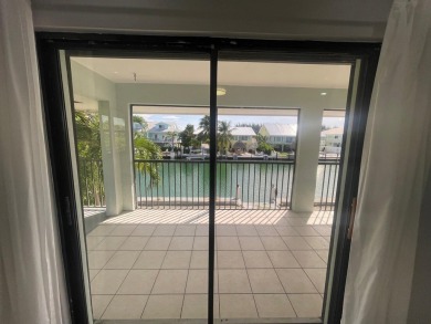 Full Duplex: Live in the gorgeous, NEW, lower level, which is on Key Colony Beach Golf Course in Florida - for sale on GolfHomes.com, golf home, golf lot