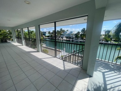 Full Duplex: Live in the gorgeous, NEW, lower level, which is on Key Colony Beach Golf Course in Florida - for sale on GolfHomes.com, golf home, golf lot