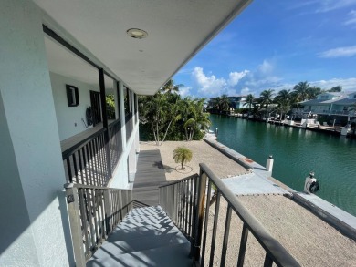 Full Duplex: Live in the gorgeous, NEW, lower level, which is on Key Colony Beach Golf Course in Florida - for sale on GolfHomes.com, golf home, golf lot